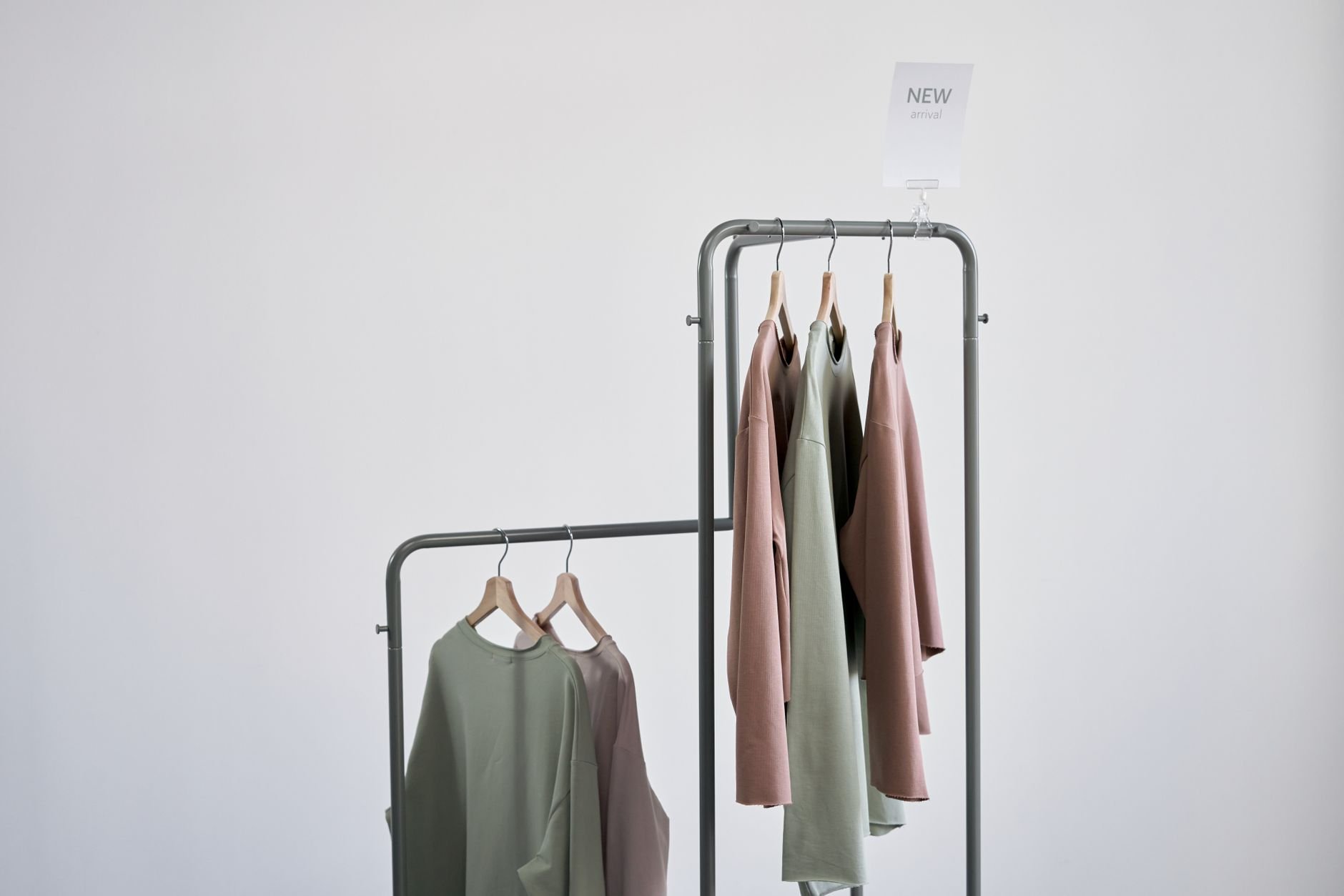 Elegant clothing rack in a minimalist boutique setting